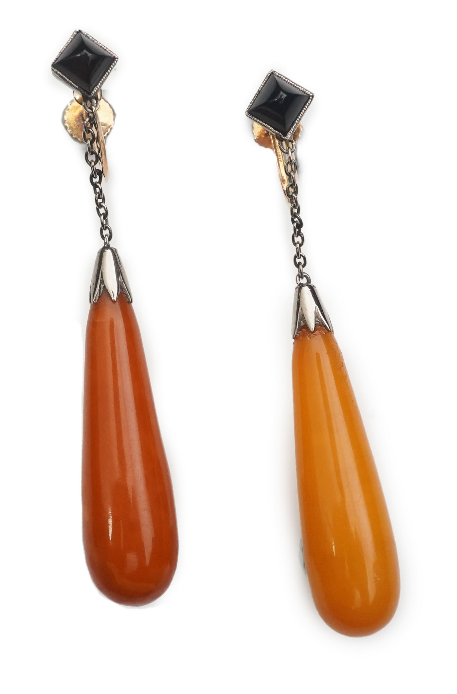 A pair of Art Deco amber and onyx earrings, circa 1920